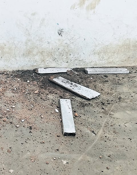 The wooden planks of the roof in
the final-year Malayalam classroom at Maharaja’s College that fell apart.