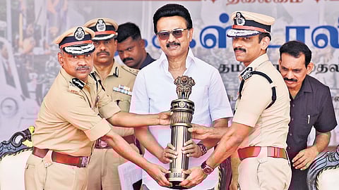 CM with police officers at the Rajarathinam stadium on Wednesday.