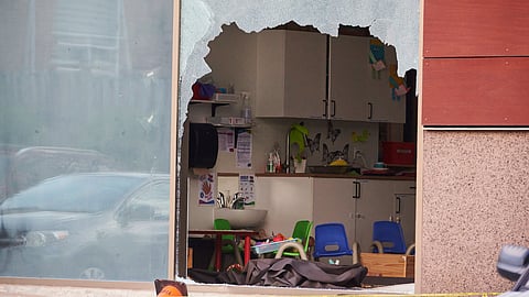 Police block off First Roots Early Education Academy after a vehicle drove through a window in Richmond Hill, Ontario, Wednesday, Sept. 10, 2025.