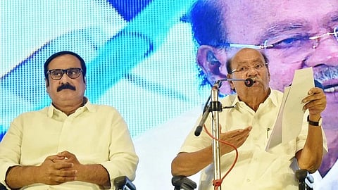PMK founder S Ramadoss at a party meet; his son Anbumani sits to his left.