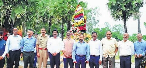 Forest Principal Secretary Kanthi Lal Dande, District Collector JV Venkata Murali, and officials pay tribute at the memorial pillar during National Forest Martyrs' Day at Nagaravanam in Bapatla on Thursday.