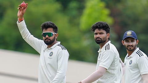 Madhya Pradesh tweakers Saransh Jain (L) and Kumar Kartikeya (C) shine on Day 1 of the Duleep Trophy final in Bengaluru on Thursday