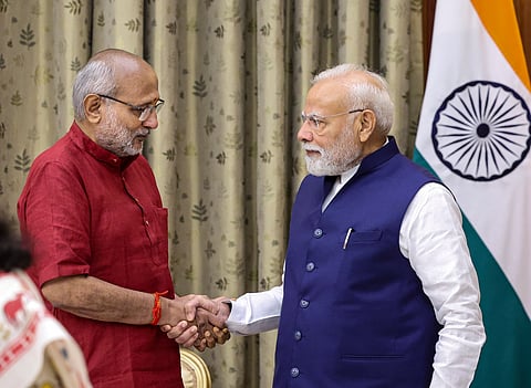 Vice President CP Radhakrishnan exchanges a warm handshake with Prime Minister Narendra Modi after the swearing-in ceremony of the 15th Vice-President of India, in New Delhi.