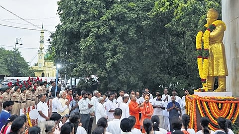Swami Bodhamayananda, Adhyaksha of Ramakrishna Math, pays tribute to the statue of Swami Vivekananda at Tank Bund in Hyderabad on the 132nd anniversary of Vivekananda’s Chicago address.