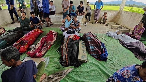 Bodies of victims, killed in an alleged hit by an army airstrike on two private schools, are laid on the ground in Thayet Thapin village in Kyauktaw township in Rakhine state, Myanmar, Friday, Sept.12, 2025.