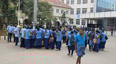 Temporary staff appointed under contract at Coimbatore Medical College Hospital (CMCH) for housekeeping and security work stage a protest demanding salary.