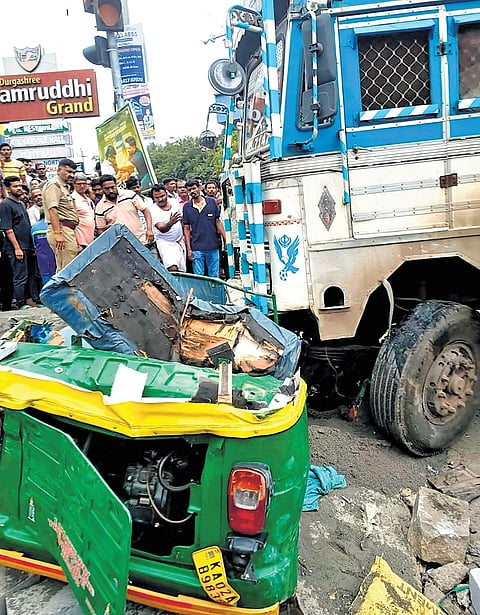 The mangled remains of the autorickshaw in the accident with the lorry near Sumanahalli Junction on Saturday.