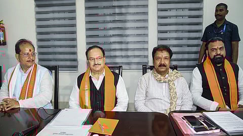 BJP National President JP Nadda with Bihar Deputy Chief Ministers Vijay Kumar Sinha and Samrat Choudhary and State BJP President Dilip Jaiswal during the BJP Core Committee meeting in Patna, Saturday, Sept. 13, 2025.
