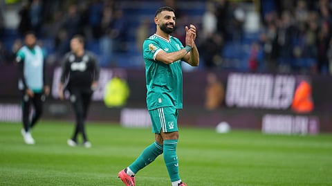 Liverpool's Mohamed Salah walks off the pitch after the Premier League soccer match between Burnley and Liverpool in Burnley, England, Sunday, Sept. 14, 2025.