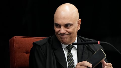 Supreme Court Justice Alexandre de Moraes attends the verdict and sentencing phase of a trial for those charged in an alleged coup plot to keep former President Jair Bolsonaro in office after his 2022 election defeat, in Brasilia, Brazil, Wednesday, Sept. 10, 2025.