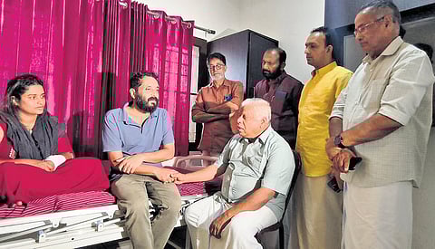 CPM state secretariat member M V Jayarajan with Padmaja, the daughter-in-law of N M Vijayan, in Kozhikode on Sunday