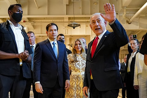Israel's PM Benjamin Netanyahu (C-R) briefs US Secretary of State Marco Rubio (C-L) and his wife Jeanette Dousdebes Rubio (C) during their visit to the Western Wall Tunnels, underneath the Jewish holy site, in the old city of Jerusalem on September 14, 2025.