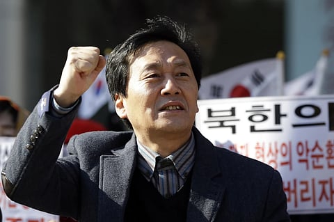 North Korean defector Kim Seong-Min, then-the head of Free North Korea Radio, shouts slogans during a rally to improve human rights condition in North Korea, in Seoul, South Korea, on Nov. 14, 2014.