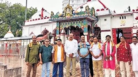 Farmers from Padmapur in front of Maa Samaleswari temple on Monday