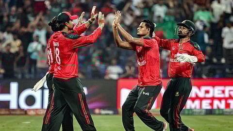 Bangladesh's wicketkeeper and captain Litton Das (R) celebrates with teammates after taking the wicket of Afghanistan's Karim Janat during the Asia Cup 2025 Twenty20 international cricket match between Afghanistan and Bangladesh on September 16, 2025.