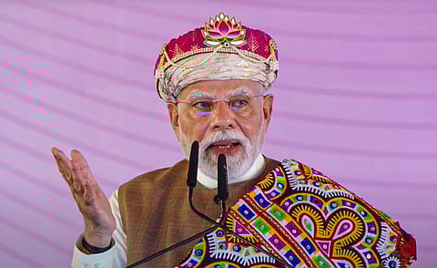 Prime Minister Narendra Modi addresses the gathering during the inauguration of the PM MITRA Park and the foundation stone laying ceremony of development works, in Dhar, Madhya Pradesh.