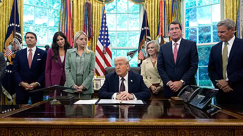 US President Donald Trump speaks as Deputy Attorney General Todd Blanche, from left, Homeland Security Secretary Kristi Noem, Attorney General Pam Bondi, Sen. Marsha Blackburn, R-Tenn., Sen. Bill Hagerty, R-Tenn., and Tennessee Gov. Bill Lee listen, in the Oval Office of the White House, Monday, Sept. 15, 2025, in Washington.