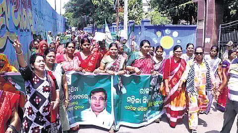 BMJD workers taking out the protest rally in Sambalpur on Wednesday.