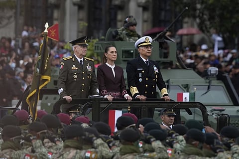 President Claudia Sheinbaum rides through the annual Independence Day military parade, in Mexico City, Tuesday, Sept. 16, 2025.