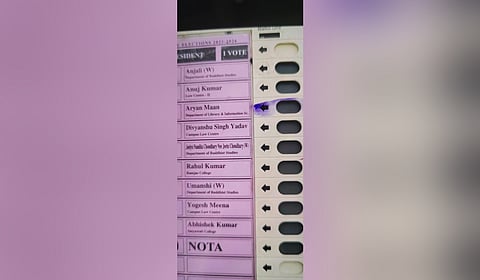 The EVM with an ink mark on the ABVP’s presidential candidate, Aryan Mann at the Delhi University Students’ Union election on 18, September 2025.