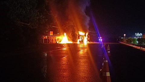 A private luxury bus was gutted in a fire on the national highway near Pallikonda in the early hours of Thursday.