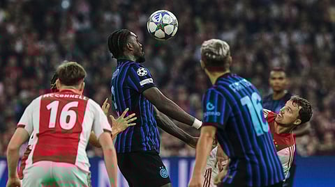 Inter Milan's Marcus Thuram, who scored his side's two goals, controls the ball during a Champions League opening phase soccer match between Ajax and Inter Milan on Wednesday, Sept. 17, 2025.