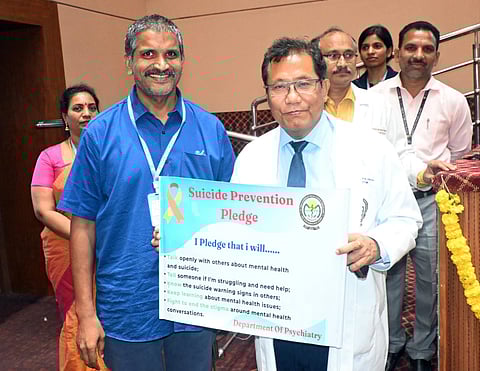Students and faculty of AIIMS Mangalagiri take part in World Suicide Prevention Week activities on the campus on Thursday.
