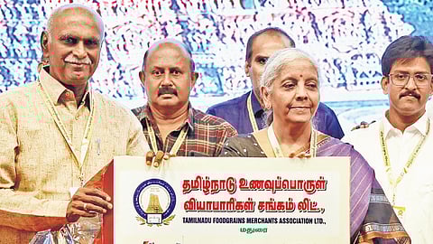 Union Finance Minister Nirmala Sitharaman releasing a book during the 80th anniversary celebrations of TN Foodgrains Merchants’ Association