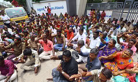Sanitation workers associated with CITU and LPF staged protest at corporation office demanding action against private agency that handle solid waste management in Madurai