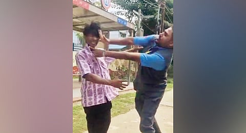 Video grab of the Ama Bus conductor slapping the passenger