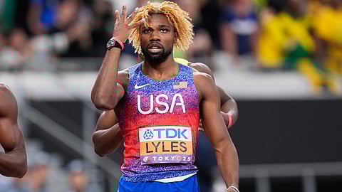 Noah Lyles reacts after winning the gold medal in the men's 200 meters final at the World Athletics Championships in Tokyo (Photo | AP)