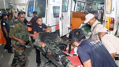 An injured security personnel being taken to the Regional Institute of Medical Sciences hospital after a terrorist attack on an Assam Rifles vehicle in Nambol Sabal area of Bishnupur, in Imphal on Friday. Reportedly, two Assam Rifles personnel, including one JCO and one jawan, killed in the ambush.