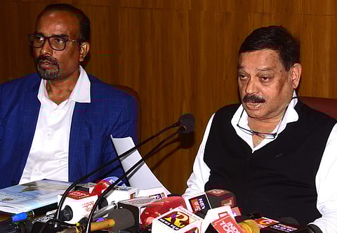 Karnataka State Backward Classes Commission Chairman Madhusudhar R Naik (R) with member secretary Dayanand during a press conference.