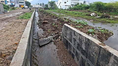 Collapsed stretch of Mookaneri canal wall after heavy rains in Salem.