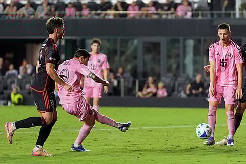 Inter Miami forward Lionel Messi, second left, scores his side's second goal against D.C. United during the second half of an MLS soccer match, Saturday, Sept. 20, 2025, in Fort Lauderdale, Fla.