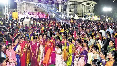 Women participate in the Mana Bathukamma Carnival celebrations on the first day of the nine-day festival at the historic Thousand Pillar Temple on Sunday evening.