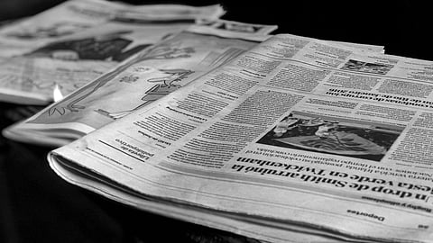 Economists urge governments to invest more in and shape the media ecosystem amid job losses, falling revenues, and AI threats to journalism.