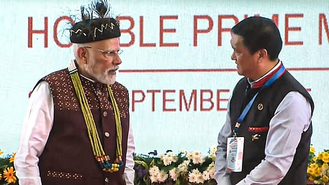 In this screengrab from a video posted on Sept. 22, 2025, Prime Minister Narendra Modi and Arunachal Pradesh Chief Minister Pema Khandu during the foundation stone laying and inauguration of various development projects, in Itanagar, Arunachal Pradesh