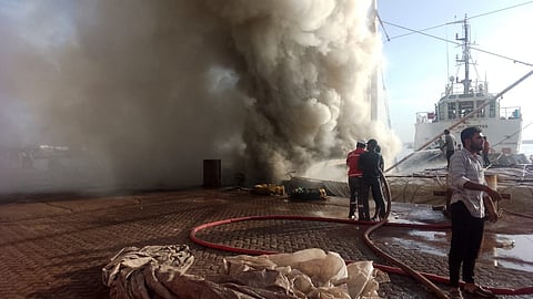 Firefighters battled the fire at sea, but the ship sustained extensive damage.