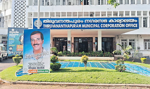 A hoarding paying tribute to the late BJP councillor, K Anil Kumar, erected on the Thiruvananthapuram corporation office premises