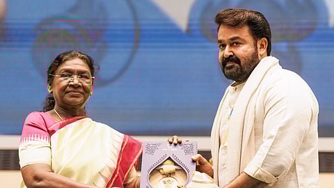 President Droupadi Murmu presents the 'Dadasaheb Phalke award for 2023' to Malyalam film actor Mohanlal during the 71st National Film Awards, in New Delhi, Tuesday.