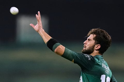 Pakistan's Shaheen Shah Afridi takes a ball during the Asia Cup Cricket match between Pakistan and Sri Lanka at Zayed Cricket Stadium in Abu Dhabi, United Arab Emirates, Tuesday, Sept. 23, 2025.