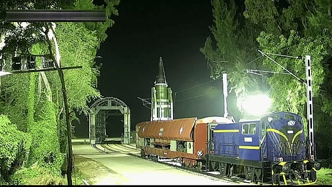 The Agni-Prime missile test-fired from a rail-based mobile launcher platform.