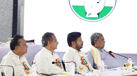 Karnataka CM Siddaramaiah and his Telangana counterpart A Revanth Reddy at the Congress Working Committee meeting in Patna, Bihar, on Wednesday.