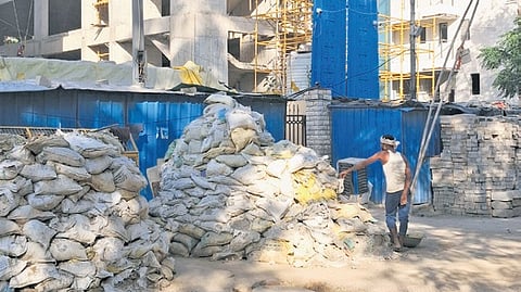 But residents say many builders are ignoring basic safeguards, worsening dust levels and adding to seasonal pollution woes.