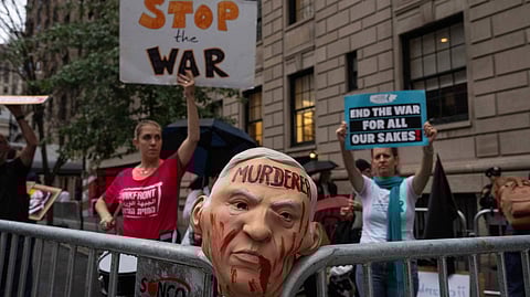 Protesters chant against the arrival of Israel's prime minister Benjamin Netanyahu during the 80th session of the United Nations General Assembly, Thursday, Sept. 25, 2025, in New York.