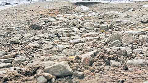 Work on to fill potholes on the Outer Ring Road near Kamakaya Theatre in Bengaluru.
