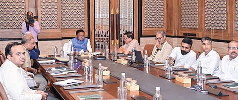 Chief Minister Mohan Charan Majhi reviewing the situation arising out of continuous rains, at Jharsuguda on Friday.