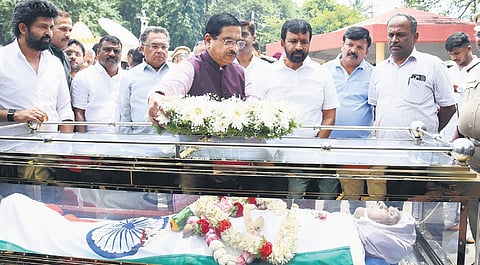 Union Minister Pralhad Joshi pays his last respects to writer SL Bhyrappa in Mysuru on Friday.