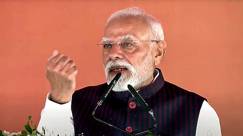 Prime Minister Narendra Modi addresses the gathering during the foundation stone laying and inauguration of various development projects at a public rally, in Jharsuguda, Odisha.
